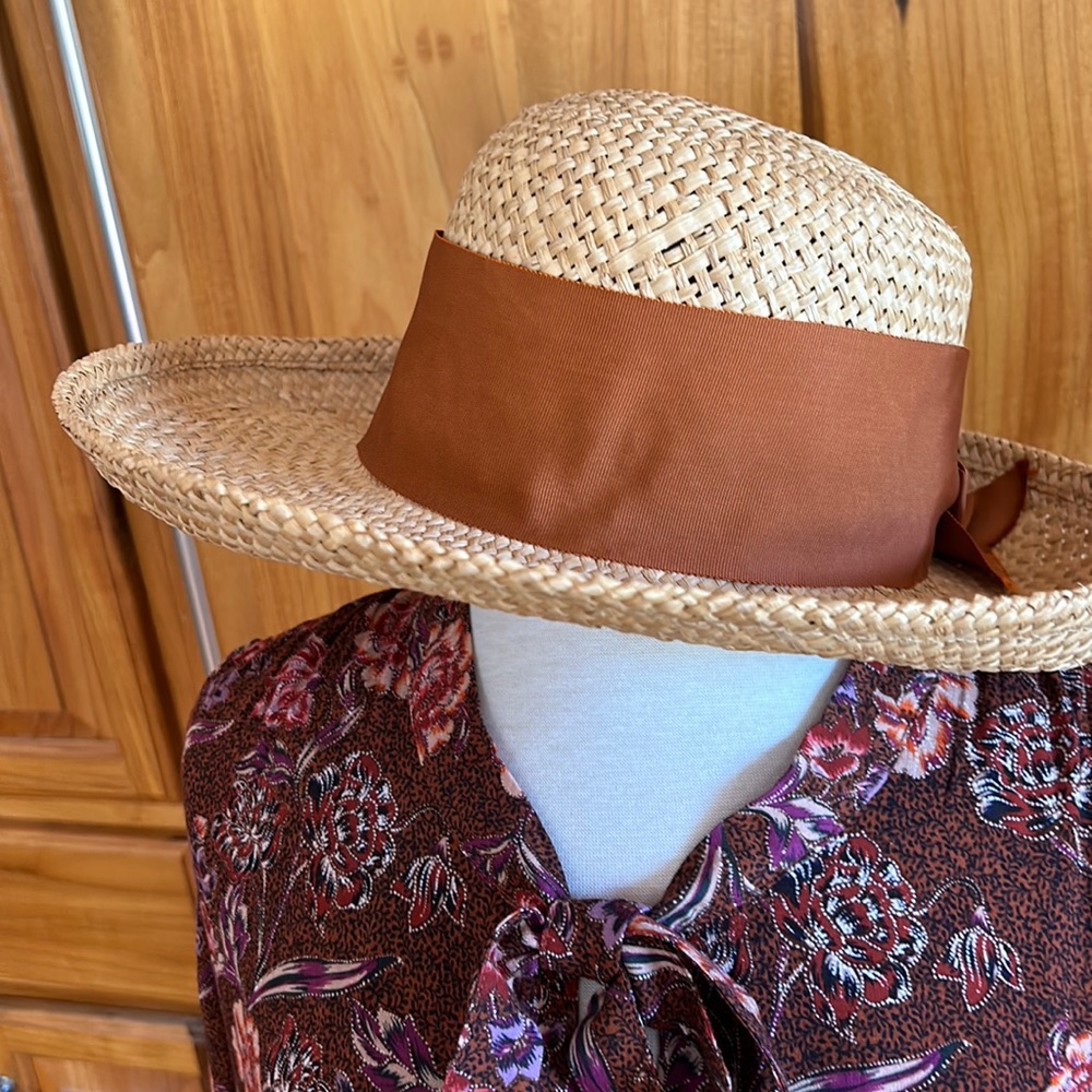 Street Smart by Betmar straw hat with rust color grosgrain ribbon band.